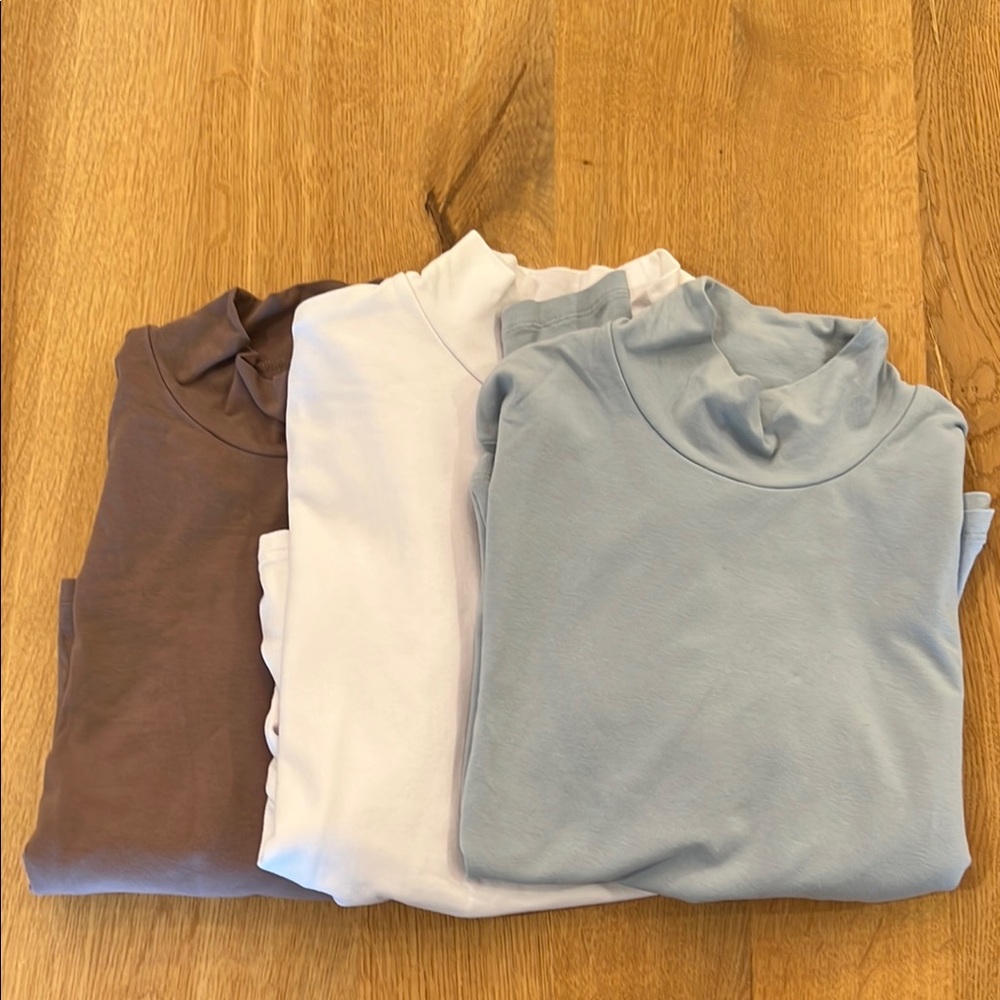 Abercrombie & Fitch Long Sleeve Tees in Light Blue, White, and Brown